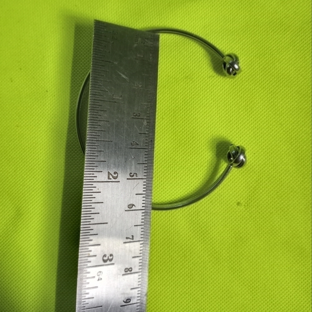 Silvertone wire knot cuff bracelet - Picture 2 of 4